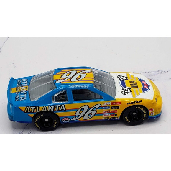 1996 Racing Champions NAPA 500 Program Car 1/64 Stock Car New in Package #97 - Picture 1 of 10